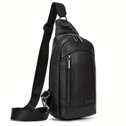 Zaino monospalla in pelle nera, design elegante e moderno, con cerniere multiple e tracolla regolabile. Ideale per uomo, moda urbana.