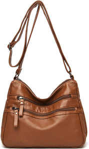 Borsa a tracolla in pelle marrone con cerniere multiple, design elegante e pratico, ideale per donna. Accessorio moda versatile e capiente.