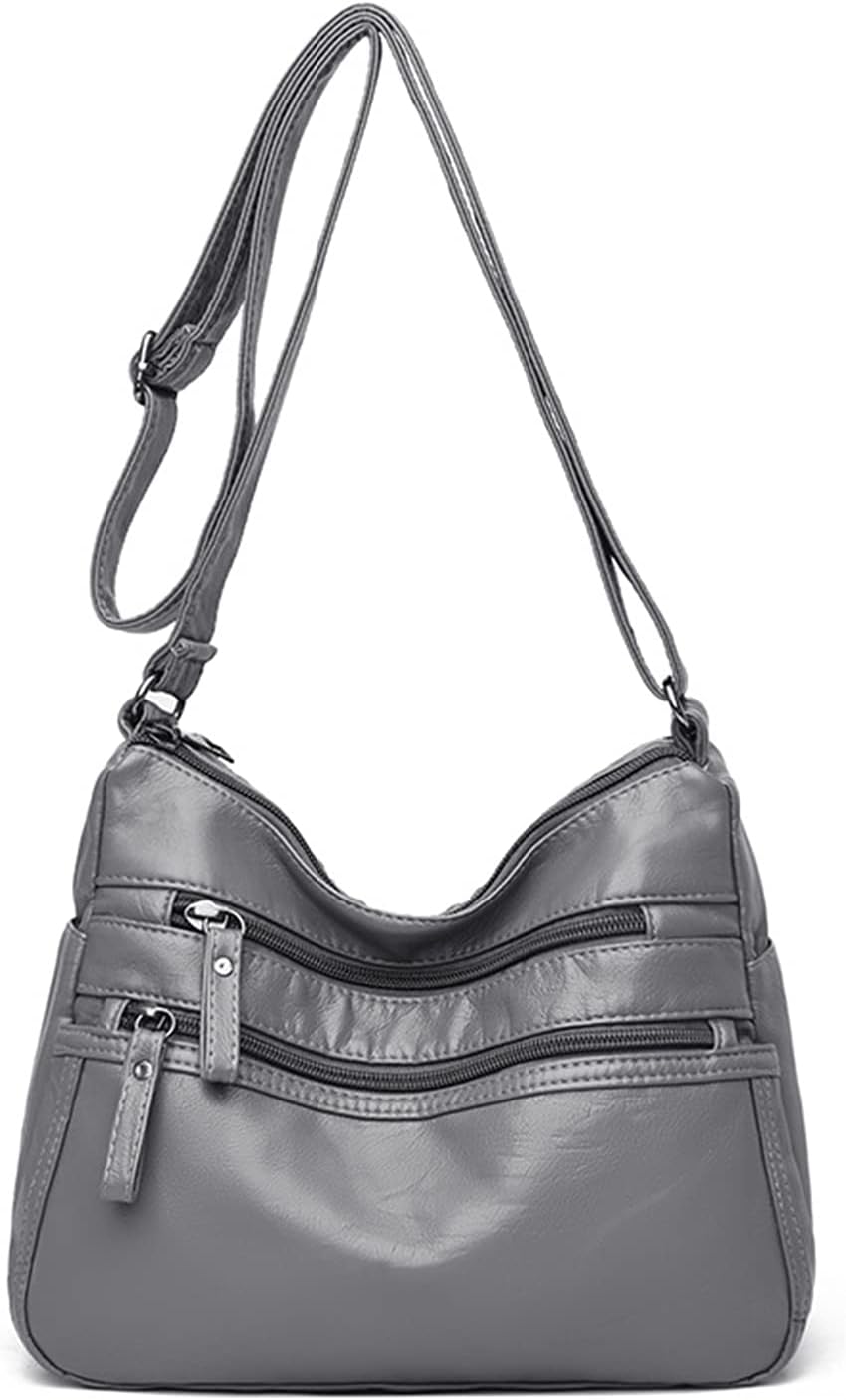 Borsa a tracolla in pelle grigia con cerniere multiple, design elegante e pratico, ideale per donna. Accessorio moda versatile e spazioso.