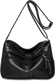 Borsa a tracolla in pelle nera con cerniere multiple, design elegante e pratico, ideale per donna. Accessorio moda versatile e spazioso.