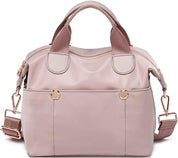 Borsa a mano donna in nylon rosa, design elegante con manici e tracolla regolabile, dettagli in metallo dorato, ideale per moda e praticità.