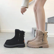 Stivali invernali da donna, neri e beige, con cerniera laterale e suola antiscivolo, ideali per look casual e comfort invernale.
