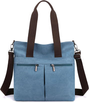 Borsa a tracolla in tela blu con manici marroni, doppia cerniera frontale, ideale per donna, moda casual, accessorio versatile e resistente.