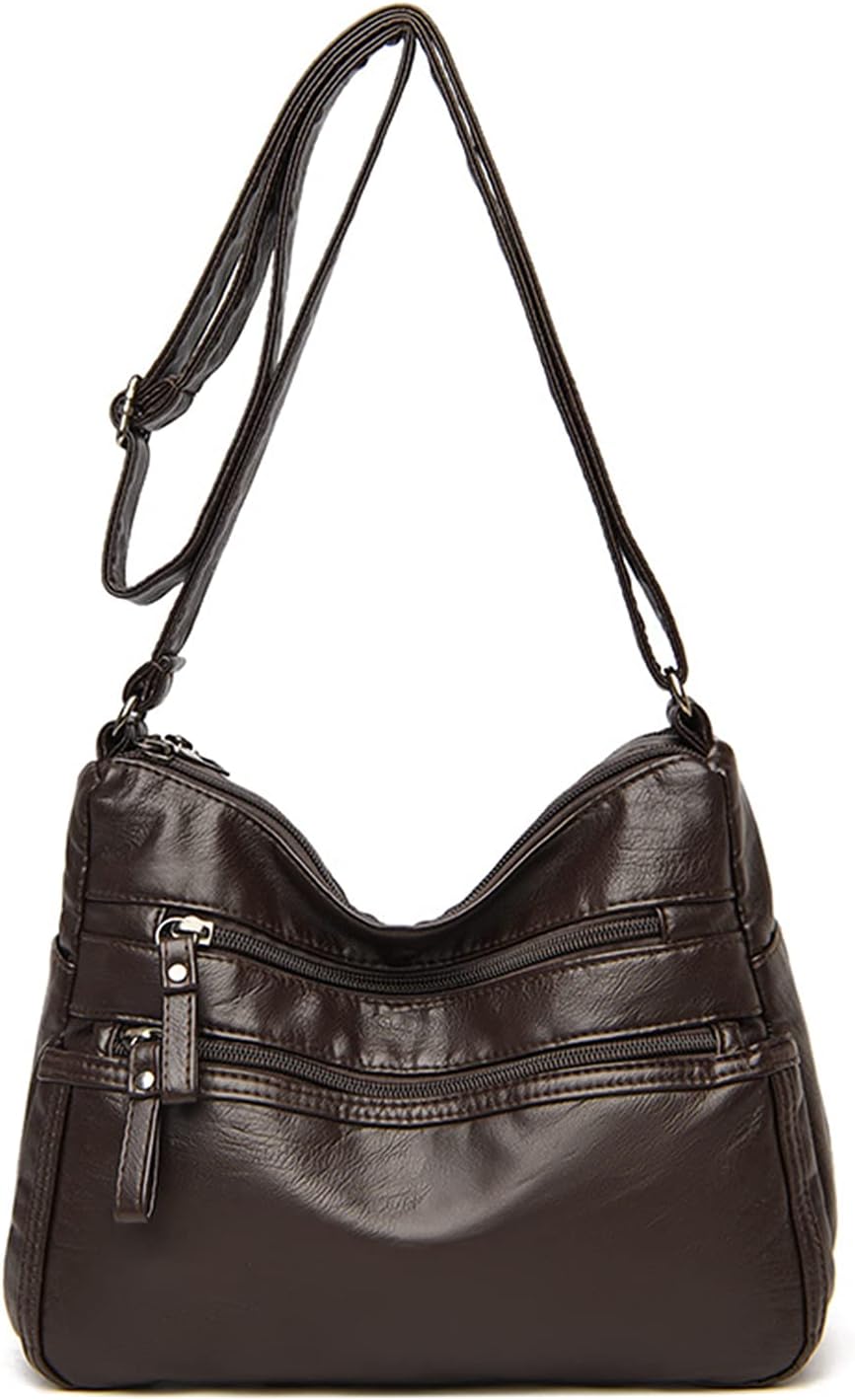 Borsa a tracolla in pelle marrone scuro con cerniere multiple, design elegante e pratico, ideale per donna. Accessorio moda versatile e di tendenza.