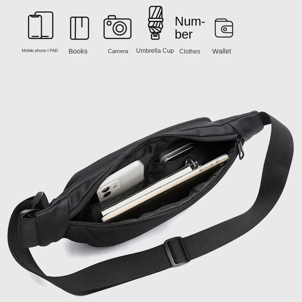 Marsupio nero aperto con scomparti, contenente smartphone, libro e tablet. Design moderno, ideale per viaggi e uso quotidiano. Tasche multiple.