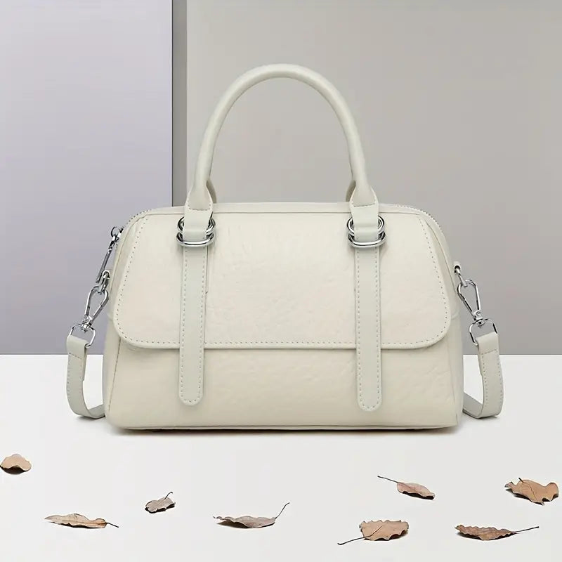 Borsa a mano bianca elegante in pelle sintetica, design moderno con manici e tracolla regolabile, perfetta per moda autunno.