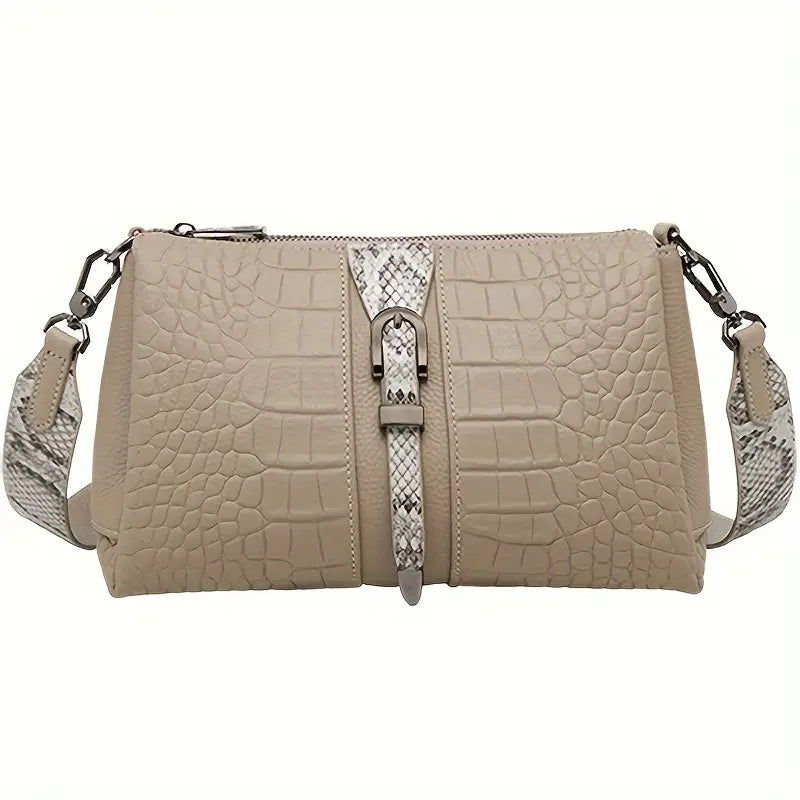 Borsa a tracolla beige in pelle effetto coccodrillo, dettagli in pelle di serpente, chiusura con fibbia, design elegante e moderno.