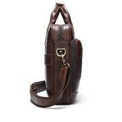 Borsa a tracolla in pelle marrone, design elegante e funzionale, con cerniera e tasche laterali. Accessorio moda uomo, ideale per lavoro e viaggio.