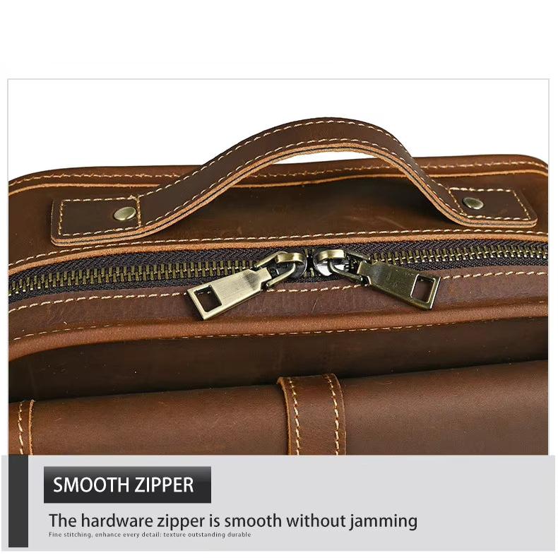 Borsa in pelle marrone con cerniera liscia, manico robusto e cuciture precise. Design elegante e durevole, ideale per lavoro e viaggi.