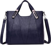 Borsa a mano donna in pelle sintetica blu scuro, design elegante con tracolla regolabile, accessori metallici, moda femminile, shopping.