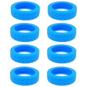 Otto gomme in silicone blu per giocattoli, con battistrada dettagliato, ideali per auto telecomandate. Accessori durevoli e di alta qualità.