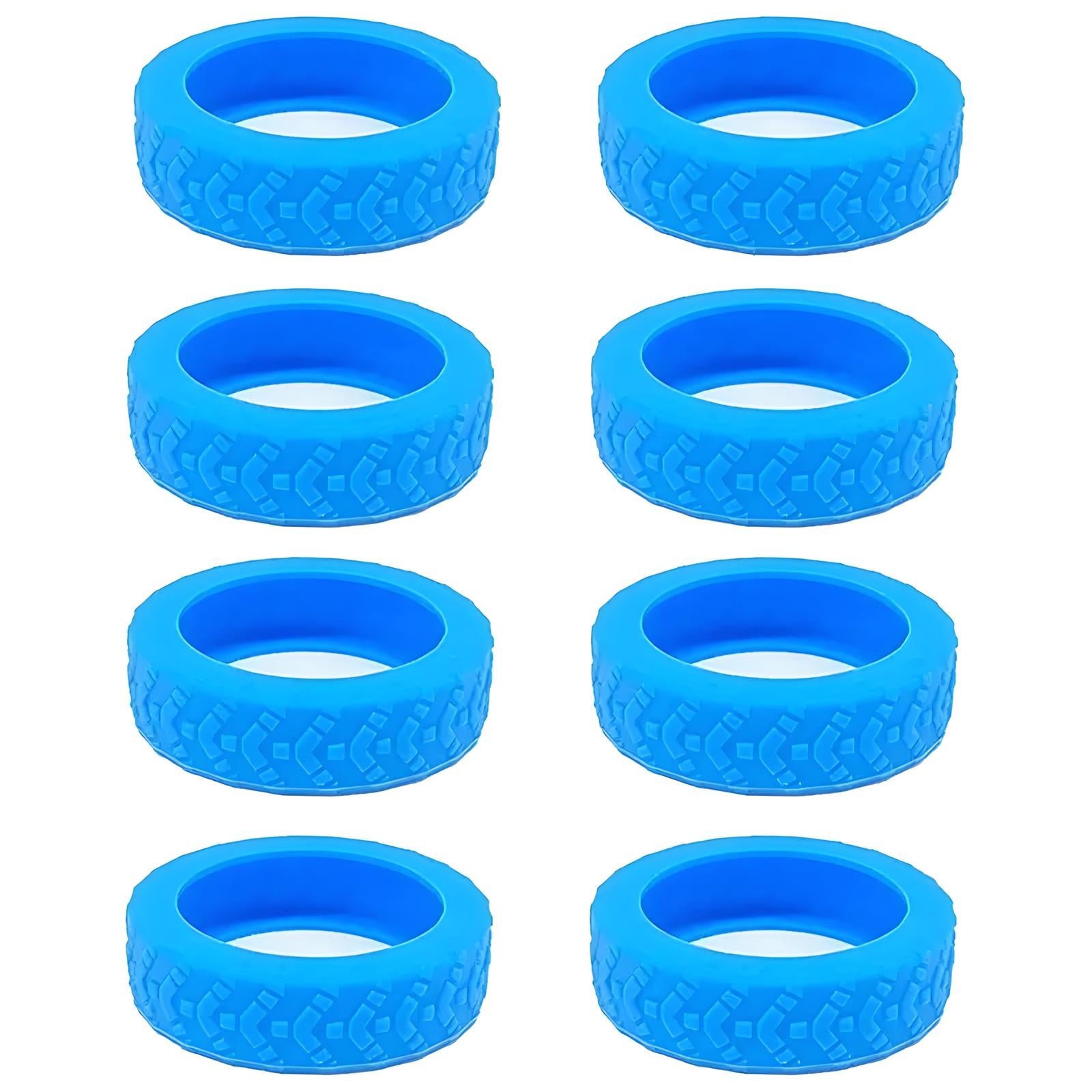 Otto gomme in silicone blu per giocattoli, con battistrada dettagliato, ideali per auto telecomandate. Accessori durevoli e di alta qualità.