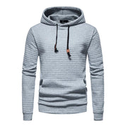 Felpa con cappuccio grigia a trama quadrettata, design casual, cordini regolabili, ideale per moda uomo autunno inverno.