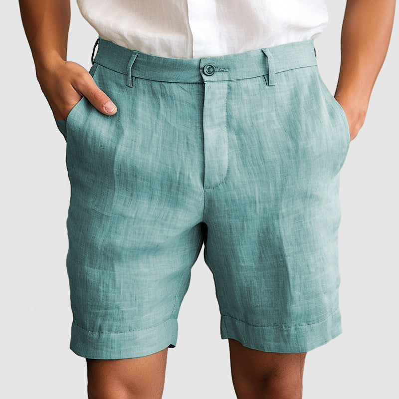 Pantaloncini uomo in lino verde acqua, eleganti e leggeri, perfetti per l'estate. Design moderno con tasche laterali, ideale per look casual.