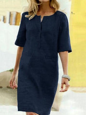 Abito donna blu scuro, maniche corte, scollo a V, stile casual elegante. Perfetto per occasioni estive e look quotidiani.