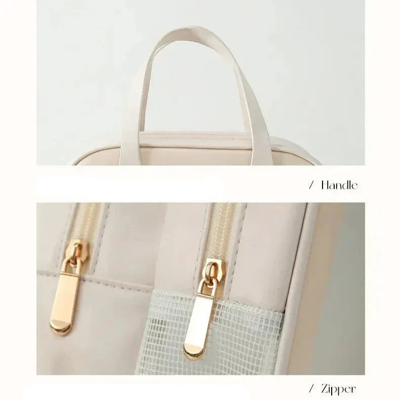 Borsa beige con manico e cerniera dorata, design elegante e minimalista, ideale per moda femminile e accessori di tendenza.