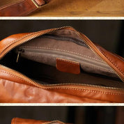 Borsa a tracolla in pelle marrone con cerniera aperta, tasca interna visibile. Elegante e pratica per lavoro o viaggio. Accessorio moda uomo.