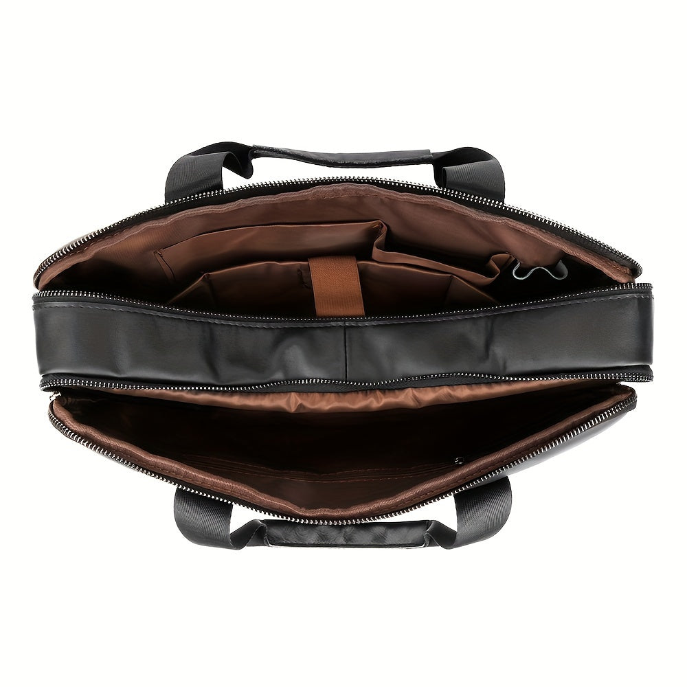 Borsa porta computer in pelle nera, vista dall'alto, con scomparti interni marroni. Elegante e funzionale, ideale per lavoro e viaggio.