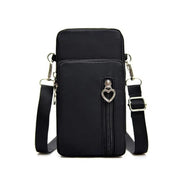 Borsa a tracolla nera in nylon con cerniera e decorazione a cuore, design compatto, ideale per smartphone e accessori. Accessorio moda donna.