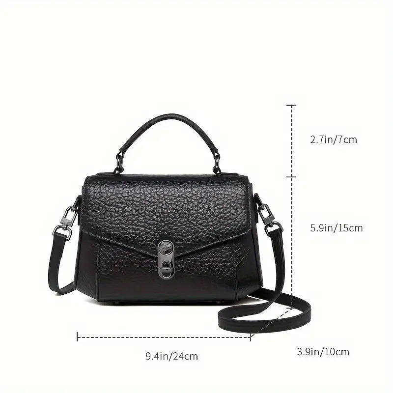 Borsa a tracolla nera in pelle, design elegante con manico superiore, chiusura a scatto, dimensioni 24x15x10 cm, ideale per moda femminile.