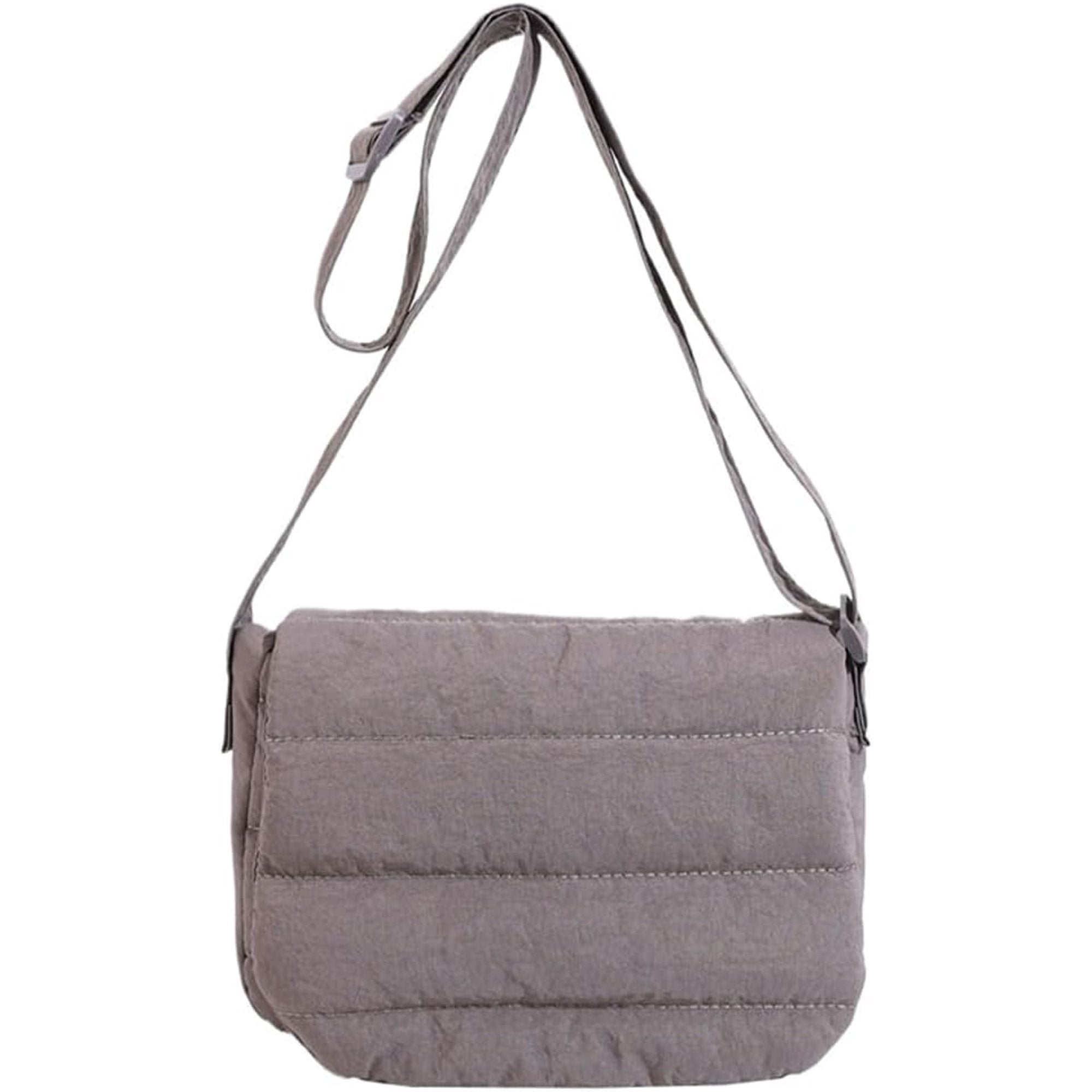 Borsa a tracolla imbottita grigia, design moderno, tessuto trapuntato, chiusura a patta, ideale per moda casual e quotidiana.