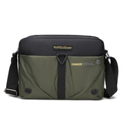 Borsa a tracolla unisex verde e nera, design moderno, tasche frontali, cinghia regolabile, ideale per lavoro e viaggio.