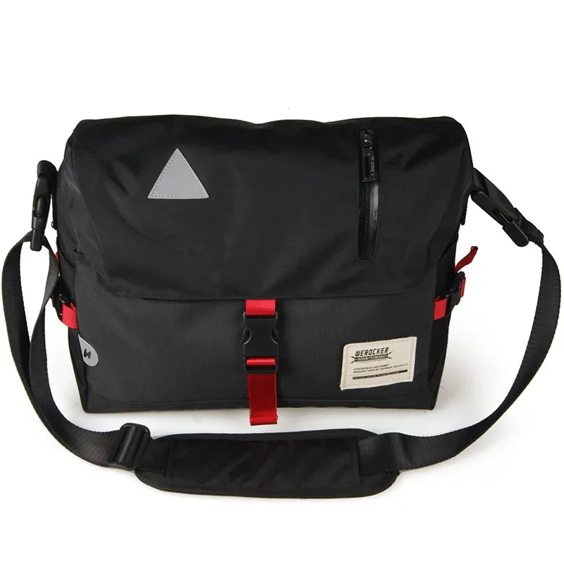 Borsa a tracolla nera unisex, design moderno, con dettagli rossi e tasca frontale con zip. Ideale per lavoro e viaggio. Accessorio moda pratico.