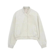 Giacca bomber donna beige, tessuto morbido, chiusura a bottoni, tasche laterali, stile casual, moda autunno inverno, abbigliamento femminile.
