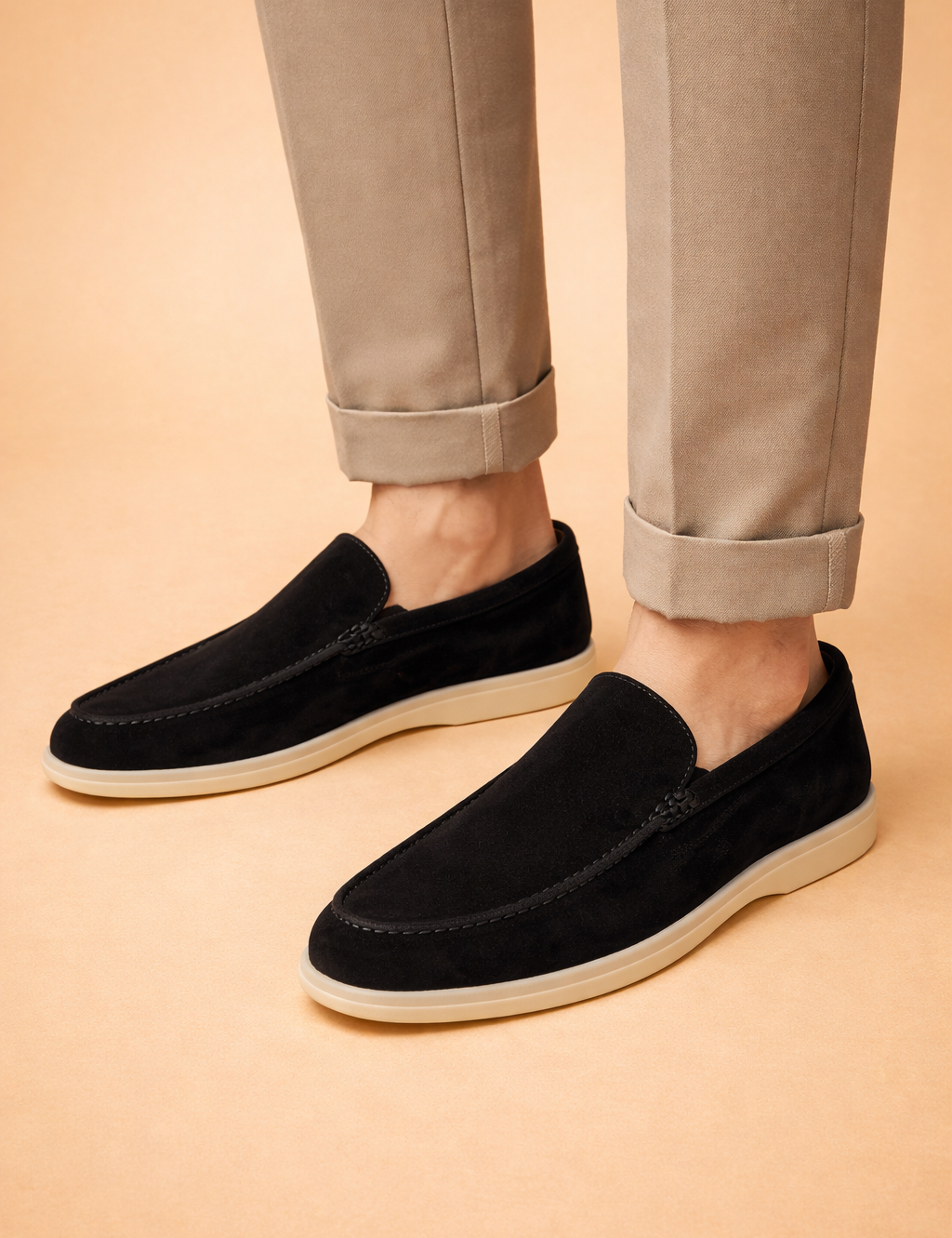 Black_suede_loafers_and_beige_trousers.png