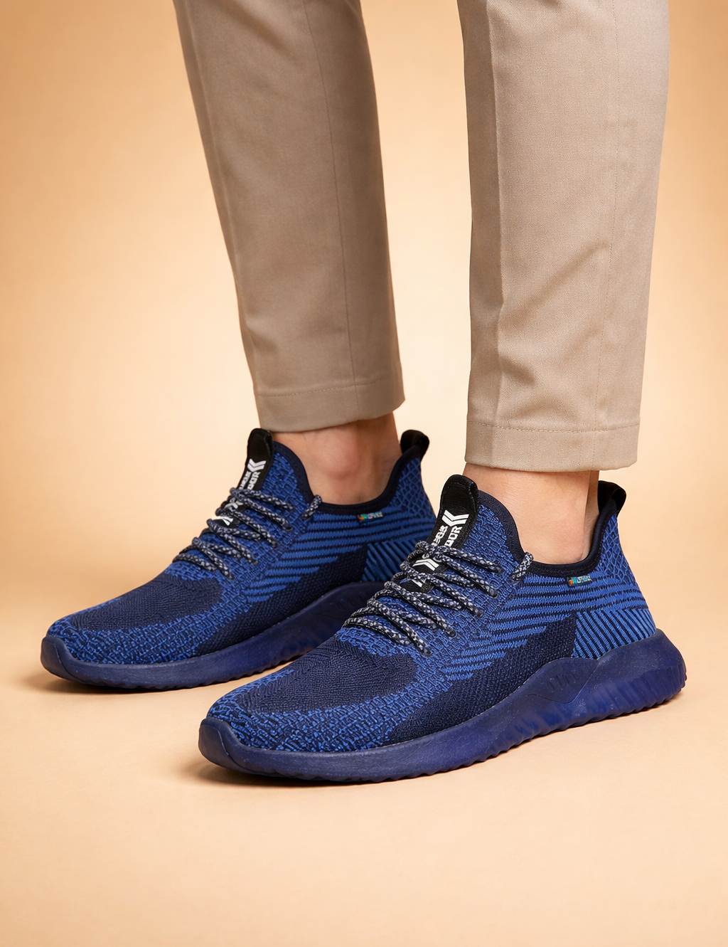 Blue_knit_sneakers_and_beige_pants.png