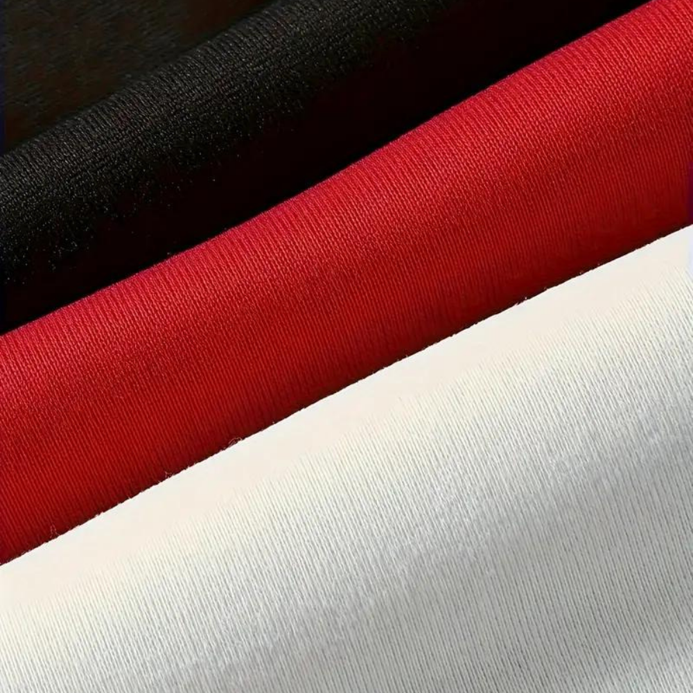 Tre tessuti in cotone a tinta unita: nero, rosso e bianco. Ideali per abbigliamento, cucito e artigianato. Alta qualità, morbidezza garantita.