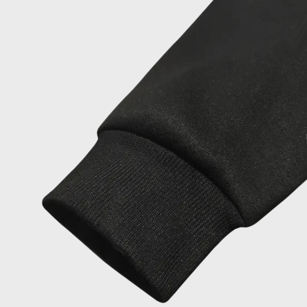 Manica felpa nera in cotone, polsino elasticizzato, tessuto morbido e resistente, abbigliamento casual uomo donna, moda autunno inverno.