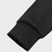 Manica felpa nera in cotone, polsino elasticizzato, tessuto morbido e resistente, abbigliamento casual uomo donna, moda autunno inverno.