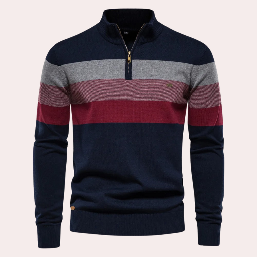 Maglione uomo a righe blu, grigie e rosse con zip, collo alto, design elegante, ideale per autunno e inverno. Moda maschile casual.