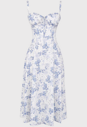 Abito estivo donna, stampa floreale blu su bianco, scollo a cuore, spalline sottili, lunghezza media. Elegante e femminile, perfetto per occasioni estive.