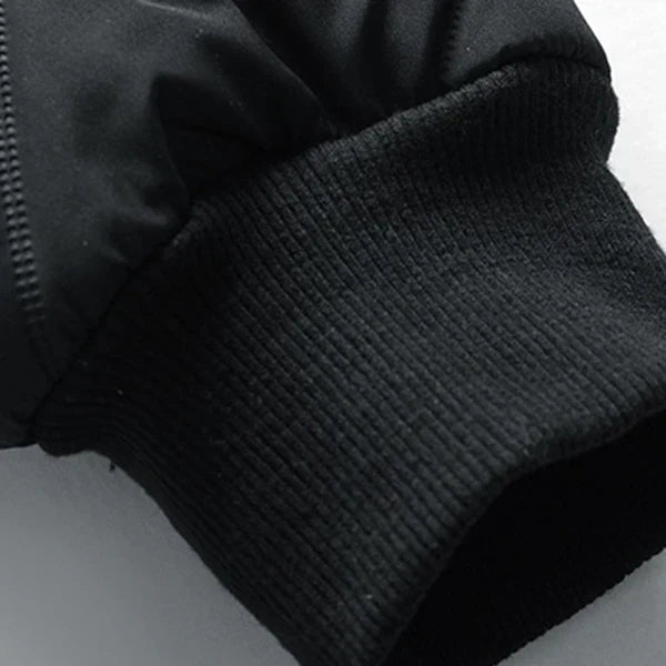 Giacca nera invernale con polsino elasticizzato, tessuto impermeabile, ideale per uomo, moda casual, abbigliamento caldo, resistente al vento.