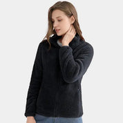 Giacca in pile nero da donna, morbida e calda, con zip frontale. Ideale per l'inverno, moda casual, abbigliamento outdoor.