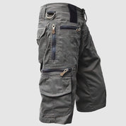 Pantaloncini cargo uomo grigi, multi-tasche, zip robuste, design casual, ideale per outdoor e attività sportive. Tessuto resistente e confortevole.