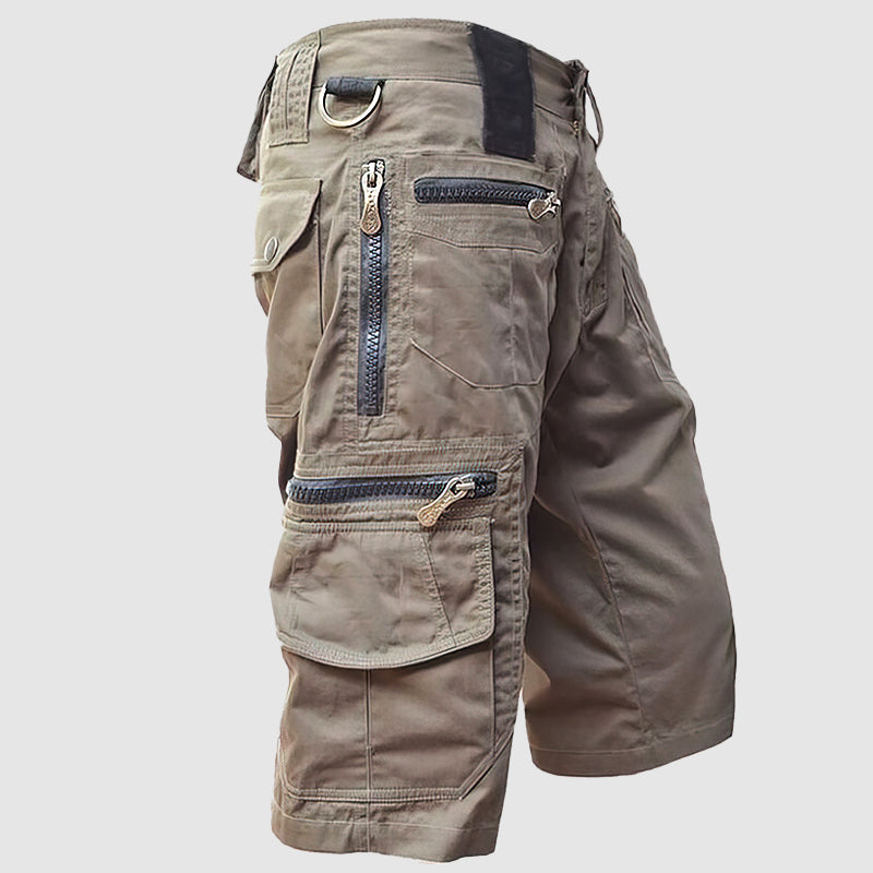 Pantaloncini cargo uomo marroni, multi-tasche con cerniere, stile casual, tessuto resistente, ideale per outdoor e attività sportive.
