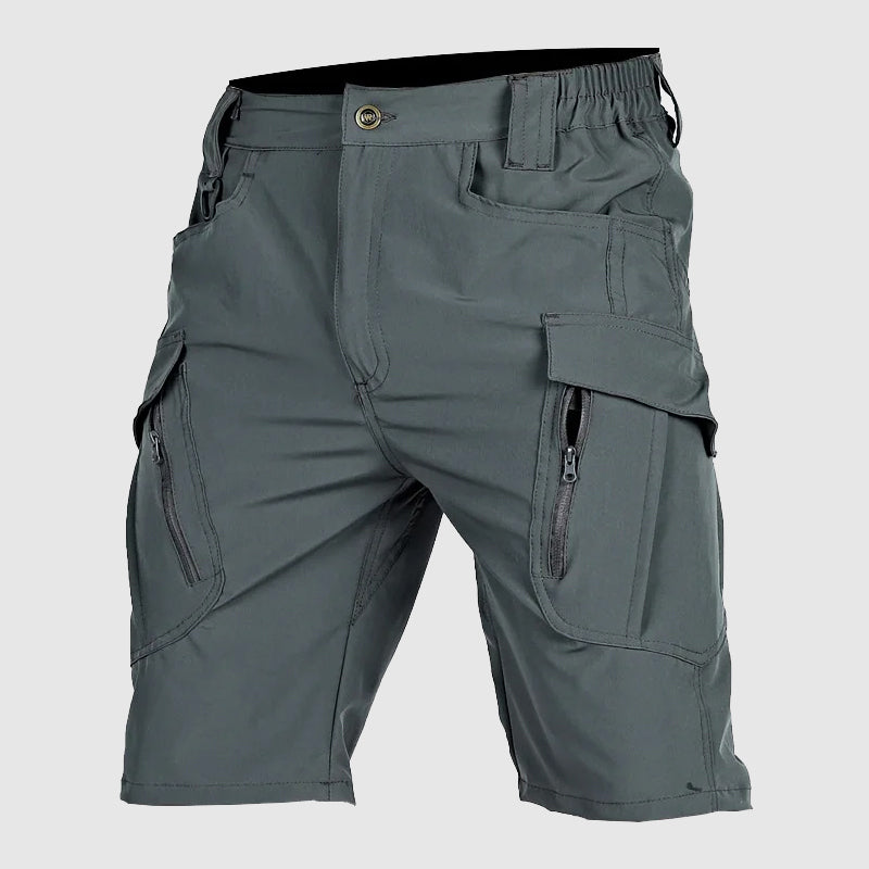 Pantaloncini cargo grigi da uomo, tasche multiple con zip, tessuto resistente, ideale per attività outdoor e casual. Design moderno e funzionale.