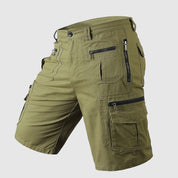 Pantaloncini cargo verdi da uomo con tasche multiple e cerniere, design casual e resistente, ideale per attività all'aperto e uso quotidiano.
