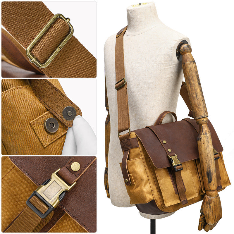 Borsa a tracolla in tela marrone con dettagli in pelle, fibbie in metallo, chiusura a scatto, mostrata su manichino. Ideale per lavoro e viaggio.