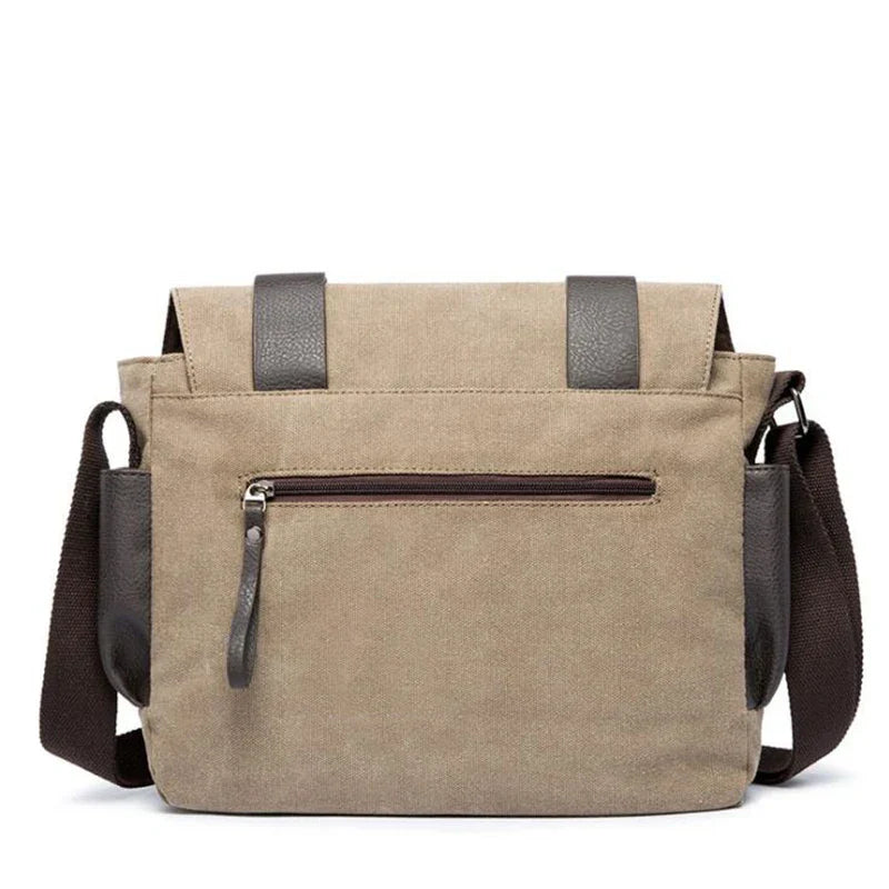 Borsa a tracolla in tela beige con cerniera frontale e dettagli in pelle marrone, ideale per uomo e donna. Design casual e resistente.