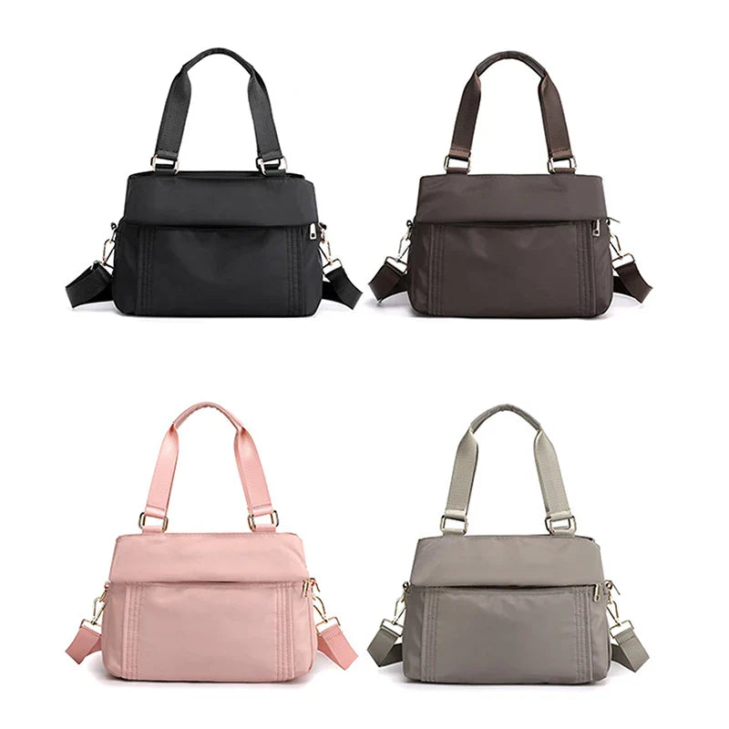 Quattro borse a tracolla in nylon impermeabile, colori nero, marrone, rosa e grigio, con manici e tracolla regolabile, design elegante e pratico.