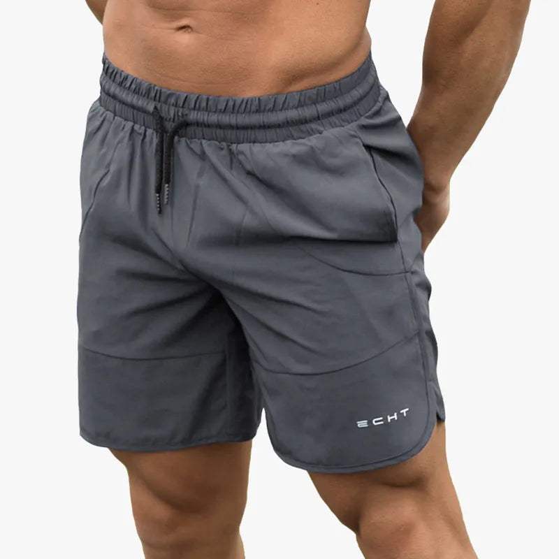 Shorts sportivi grigi da uomo, marca ECHT, con elastico in vita e tasche laterali. Ideali per palestra, fitness e allenamento.