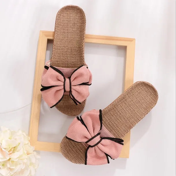 Sandali estivi da donna con fiocco rosa, suola intrecciata, design elegante, perfetti per la moda estiva e il comfort quotidiano.