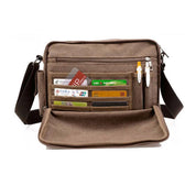 Borsa a tracolla in tela marrone con tasche multiple, scomparti per carte di credito e penne, ideale per lavoro e viaggio. Design pratico e resistente.