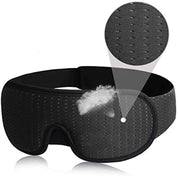 Maschera per dormire nera in memory foam, traspirante e regolabile, con dettaglio tessuto a rete. Ideale per sonno profondo e comfort.