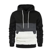 Felpa con cappuccio uomo, design a blocchi di colore nero, grigio e bianco, tasca frontale, cordini bianchi, moda casual, abbigliamento autunnale.