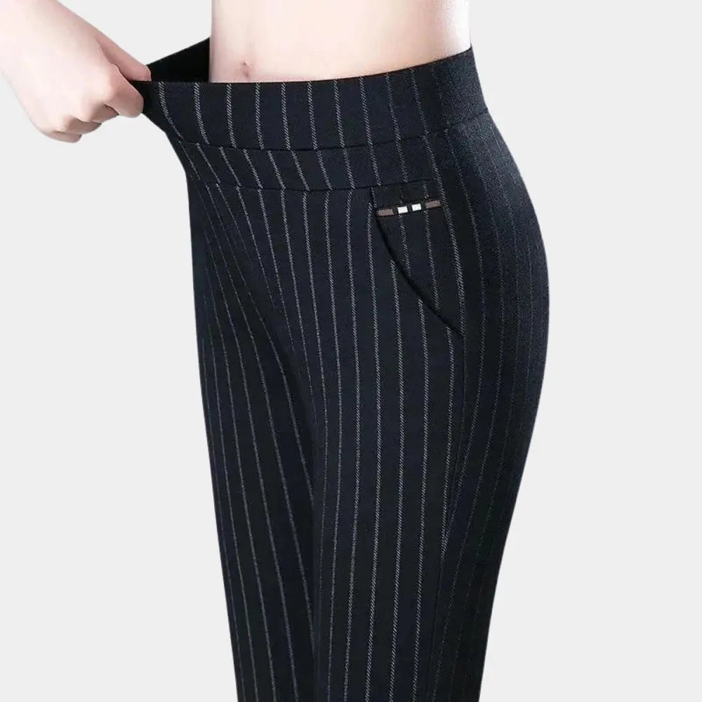 Pantaloni a righe nere elasticizzati da donna, vita alta, tasca laterale, moda elegante, abbigliamento casual, comfort quotidiano.